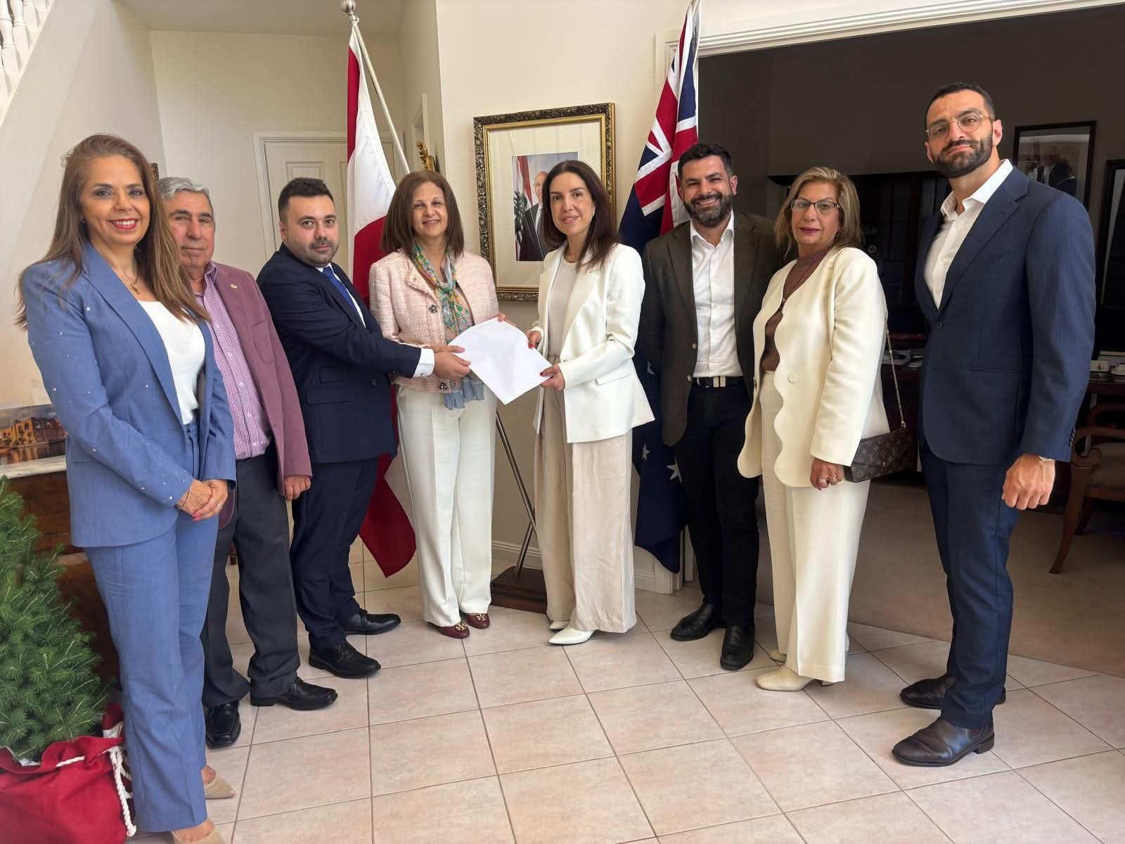 Lebanese Ambassador to Australia Mirna Khawly with representatives of 19 Lebanese expatriate groups: Carine Khoury, Pierre El Sokhn, George Salloum, and Widad Rahme discussing expatriate voting rights and community issues.